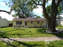 Charming single-story home with mature trees and a well-maintained lawn, perfect for outdoor enjoyment at 3213 S Cherokee Rd, Muncie, IN 47302
