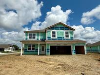 View of a two-story home under construction, showcasing the exterior design and garage at 6016 Granby Dr, Whitestown, IN 46075