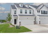 Charming two-story home with a white exterior, a two-car garage, and a well-maintained lawn at 7282 Shroyer Way, Noblesville, IN 46062