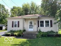 Charming single-story home with a well-maintained lawn and tidy landscaping at 249 Ohio St, Franklin, IN 46131