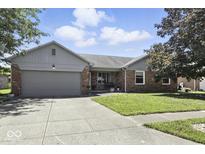 Charming single-story home with a well-maintained lawn and inviting curb appeal at 1011 Stevedon Ct, Plainfield, IN 46168