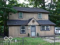 Charming two-story home with a well-maintained front yard and a classic design at 121 Lake Hart, Mooresville, IN 46158