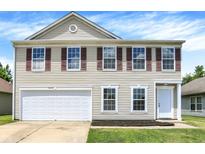 Charming two-story home with red shutters, large garage, and well-maintained lawn at 10658 Pavilion Dr, Indianapolis, IN 46259