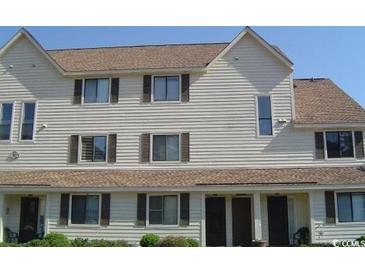 Front view of a light beige multi-unit building with brown roof at 510 Fairwood Lakes Dr. # 16M, Myrtle Beach, SC 29588