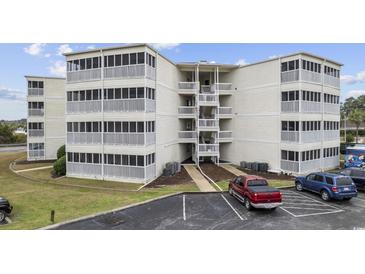 Multi-story building with ample parking at 4350 Intercoastal Dr. # 1108, Little River, SC 29566