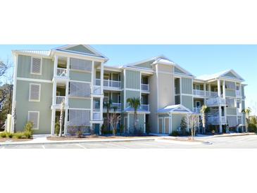 Two-story building with light green siding, white trim, and balconies at 81 Delray Dr. # 3-D, Murrells Inlet, SC 29576