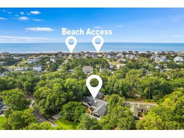 Aerial view showing home's location near beach access and other homes at 1202 Prince William Rd., North Myrtle Beach, SC 29582