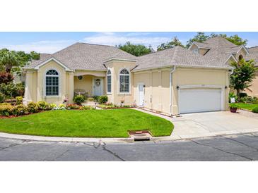 Attractive one-story home with landscaped yard and two-car garage at 4333 Windy Heights Dr., North Myrtle Beach, SC 29582