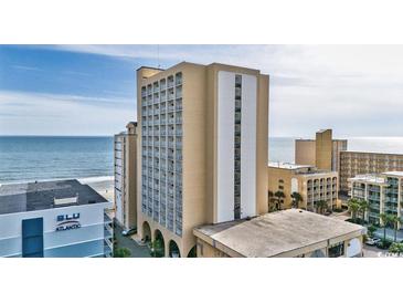 Coastal condo exterior featuring multiple floors and balconies overlooking the beach and ocean at 1207 S Ocean Blvd. # 20509, Myrtle Beach, SC 29577