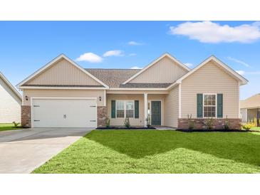 Charming single-Gathering home with a well-manicured lawn, brick accents, and a two-car garage at 343 Hayloft Circle, Conway, SC 29526