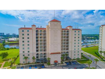 Aerial view of a luxury condo building near a marina at 2151 Bridge View Ct. # 2-902, North Myrtle Beach, SC 29582