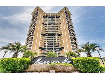 A large high-rise building with tropical landscaping and the Maisons-sur-Mer sign in the foreground at 9650 Shore Dr. # 1805, Myrtle Beach, SC 29572