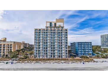 Beachfront condo building featuring multiple floors with private balconies and ocean views at 1207 S Ocean Blvd. # 20304, Myrtle Beach, SC 29577