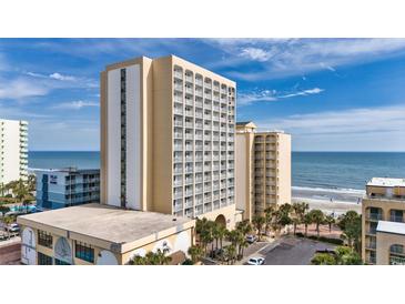 Modern resort building boasting multiple stories with private balconies offering stunning ocean views in a prime beachfront location at 1207 S Ocean Blvd. # 20308, Myrtle Beach, SC 29577