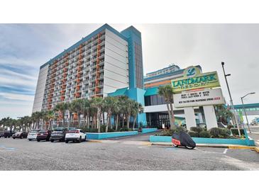 Large, beachfront resort featuring a pool, palm trees, and on-site parking at 1501 S Ocean Blvd. # 240, Myrtle Beach, SC 29577