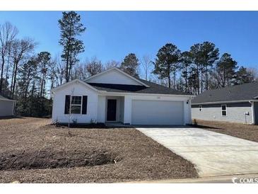 Charming one-story home featuring white siding, black shutters, and a well-manicured lawn at 1126 Cherrystone Loop, Conway, SC 29526