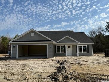 New construction featuring neutral siding, a gray roof and an attached two car garage at 3168 Wayside Rd., Conway, SC 29527