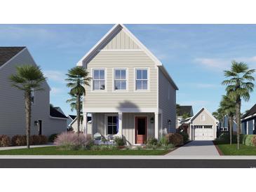 Charming two-story home with a quaint porch and a well-manicured front yard, showcasing curb appeal at 2737 Rowyn St., Longs, SC 29568