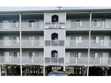 Channel Marker building exterior, featuring multiple levels and ocean views at 1317 S Ocean Blvd. # 304, Surfside Beach, SC 29575