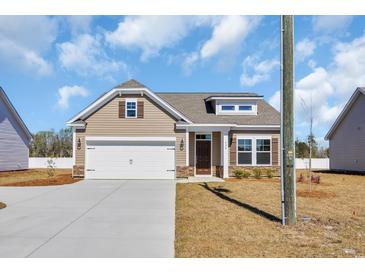 Beautiful single Gathering home featuring a charming design with a two-car garage at 432 Hallie Martin Rd., Conway, SC 29527