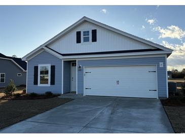 Charming single-Gathering home featuring a two-car garage and beautiful light blue siding at 1044 Jase Dr., Longs, SC 29568