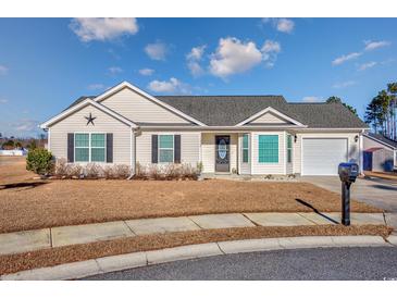 Charming single-story home featuring a well-manicured lawn and attached garage at 1217 Cymmer Ct., Conway, SC 29527