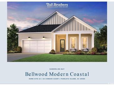 Attractive modern coastal home with two-car garage and front porch at 24 Condor Ct, Pawleys Island, SC 29585