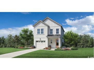 Charming two-story home with white siding, a well-manicured lawn, and beautiful landscaping at 2620 Hillbourne Loop, North Myrtle Beach, SC 29582