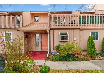 Two-story townhouse with balcony and landscaping at 305 21St Ave. S # 108, Myrtle Beach, SC 29577