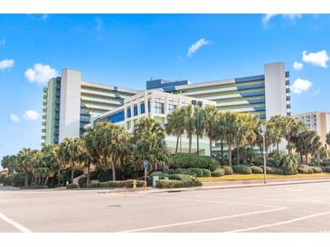 Oceanfront building with palm trees and ample parking at 1105 S Ocean Blvd. # 620, Myrtle Beach, SC 29577
