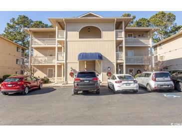 Two-story building with ample parking at 4254 Pinehurst Circle # Q4, Little River, SC 29566