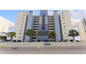 Oceanfront building, blue and white color scheme, ample parking at 4619 S Ocean Blvd. # 207, North Myrtle Beach, SC 29582