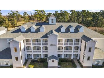 Attractive three-story building with dormers and balconies at 1001 World Tour Blvd. # 101A, Myrtle Beach, SC 29579