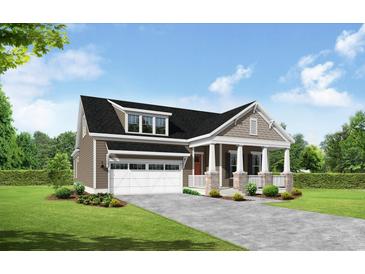 Attractive craftsman style home with front porch and two-car garage at 6521 Berg St., Murrells Inlet, SC 29576