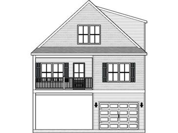 Two-story home with gray siding, black shutters, and a detached garage at 1716 26Th Ave. N, North Myrtle Beach, SC 29582