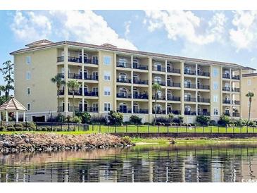 Spacious condo building with balconies overlooking a scenic waterfront view at 265 Venice Way # 1101, Myrtle Beach, SC 29577