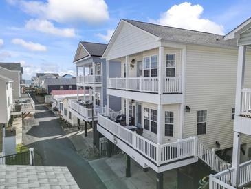 Two-story beach home with multiple balconies and ocean views at 6001-1108 South Kings Hwy., Myrtle Beach, SC 29575