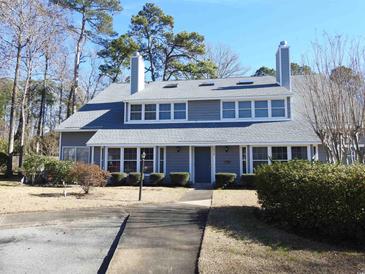 Gray two-story house with gray roof and walkway at 1210 Benna Dr. # B, Myrtle Beach, SC 29577