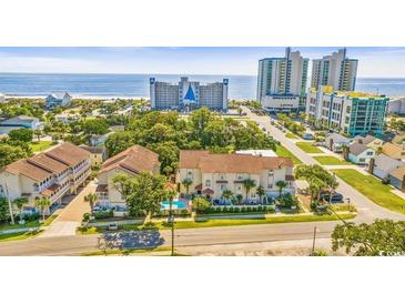 Aerial view of beachside property with ocean views and nearby high rises at 212 4Th Ave. N # 102, North Myrtle Beach, SC 29582