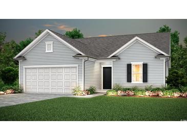 One story home with gray siding, two car garage, and landscaped yard at 261 Hawks Run Dr., Calabash, NC 28467
