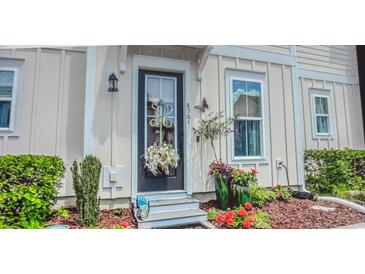 Inviting exterior with charming landscaping and a welcoming front door at 856 Filliman Alley # C, Myrtle Beach, SC 29577