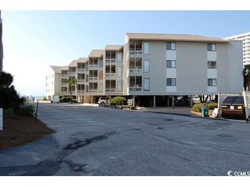 Coastal condo building with parking and ocean views at 9570 Shore Dr. # 211, Myrtle Beach, SC 29572