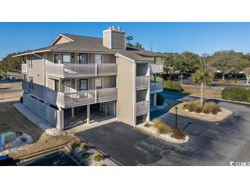 Two-story condo building with parking and ocean views at 1801 N Ocean Blvd. # K1, North Myrtle Beach, SC 29582