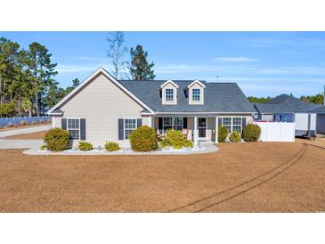 Attractive single-story house with a well-maintained lawn at 185 Royals Circle, Conway, SC 29526