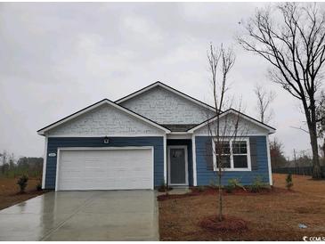 New construction home with blue siding, white trim, and a two-car garage at 1107 Black Lake Way, Conway, SC 29526