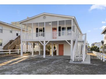 Charming beach cottage with elevated design and spacious deck at 205 56Th Ave. N, North Myrtle Beach, SC 29582