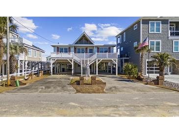 Elevated beach house with A-frame design, two-story deck, and ample parking at 324 56Th Ave. N, North Myrtle Beach, SC 29582