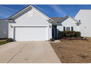 Curb appeal abounds at this charming house with a 2-car garage at 4085 Alvina Way, Myrtle Beach, SC 29579