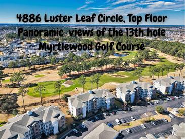 Aerial view of condo community near golf course at 4886 Luster Leaf Circle # 404, Myrtle Beach, SC 29577