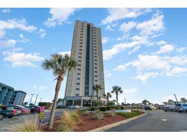 Tall building exterior with palm trees and parking at 5905 South Kings Hwy. # 908 C, Myrtle Beach, SC 29575